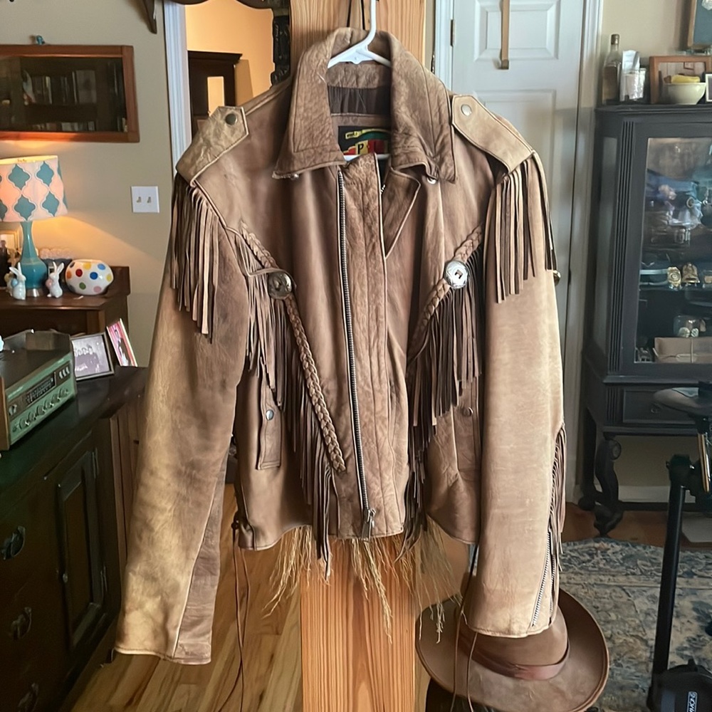 P.L.G brown leather motorcycle jacket with fringe and gauchos.